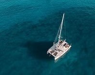 A catamaran on deep blue water