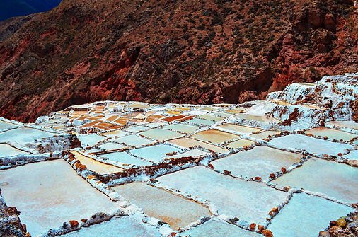 The Maras salt pans terraced into a red mountainside